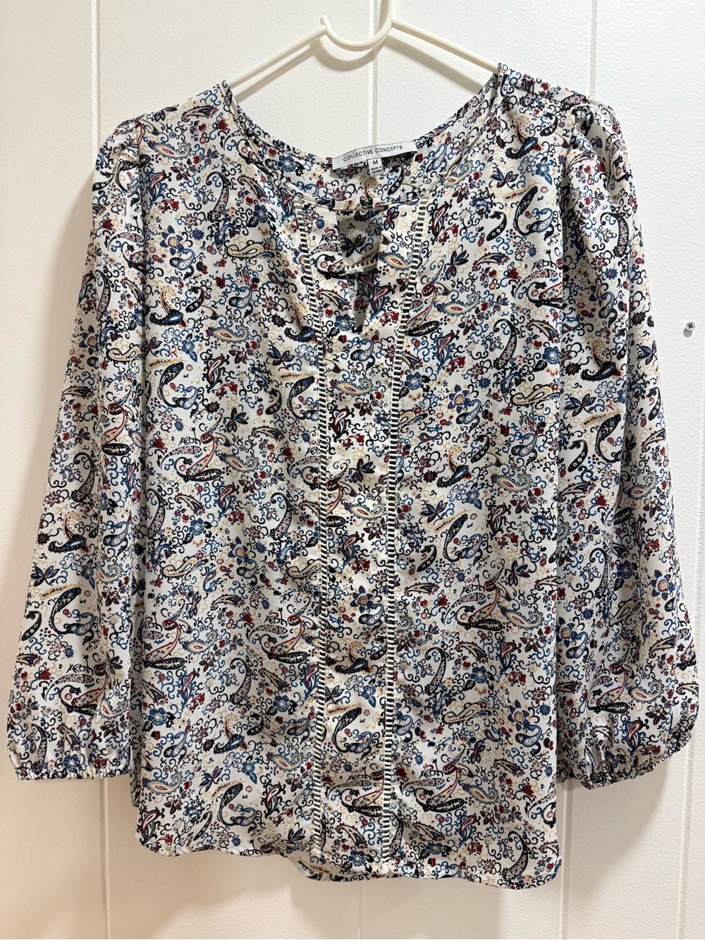 Collective Concepts Cream Paisley Tie-Neck Blouse with Blue & Red Accents